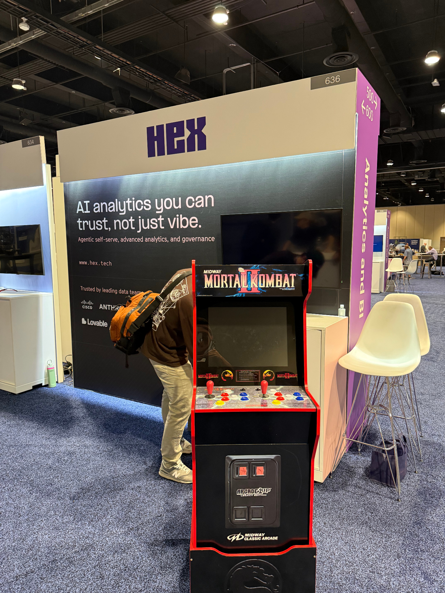 Mortal Kombat II Arcade1Up cabinet rented as a foot-traffic driver in front of the Hex tech booth at a convention center trade show